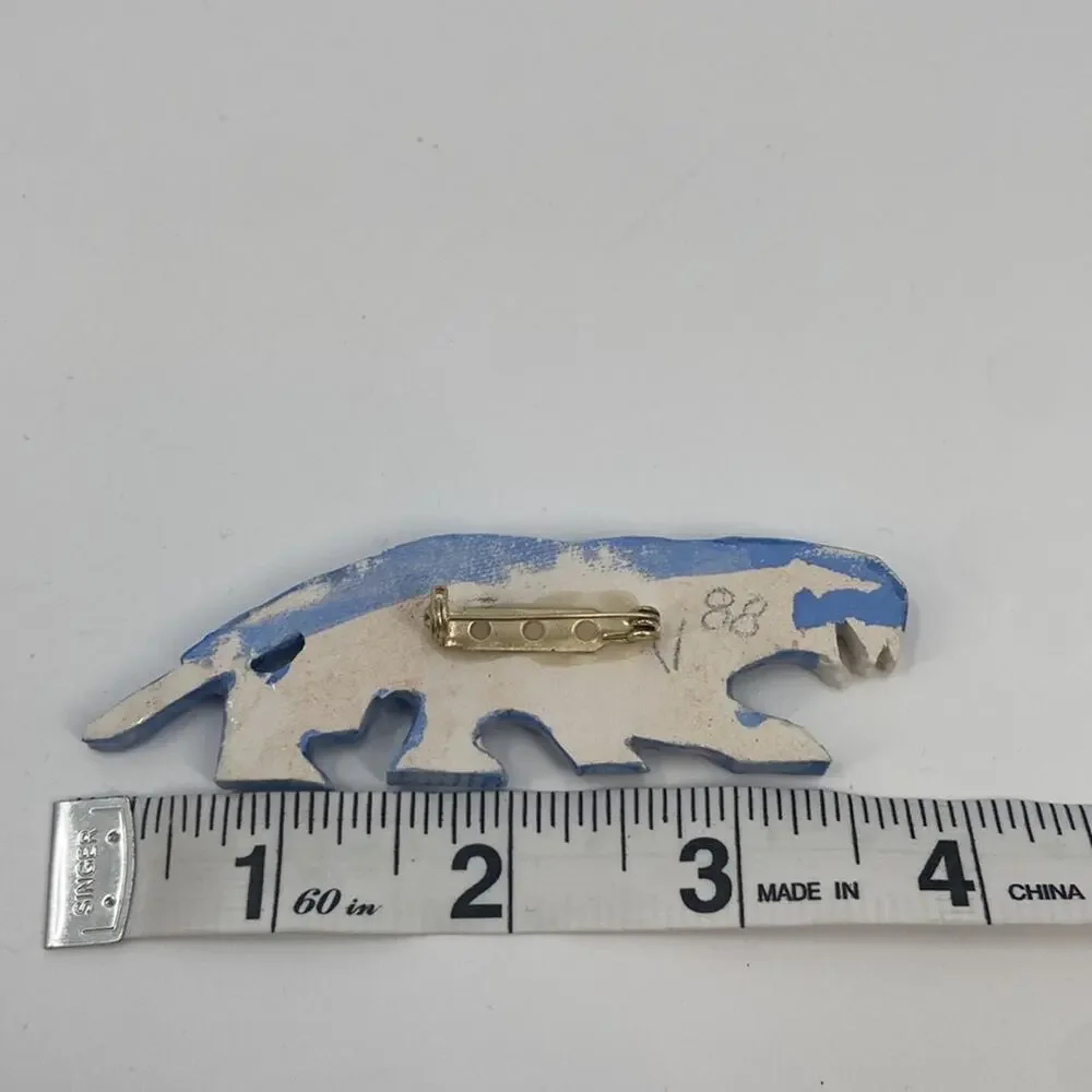 Vintage blue ceramic sabertooth tiger pin